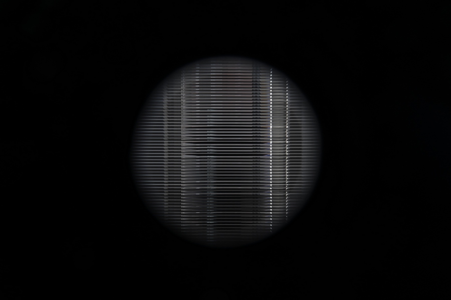 Two single holes, 2013. Detail [View from outside on Blind Screen]